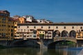 FLORENCE, ITALY Ã¢â¬â ÃÅÃÂY 25, 2017: River Arno and famous bridge Ponte Vecchio The Old Bridge at sunny summer day. Royalty Free Stock Photo